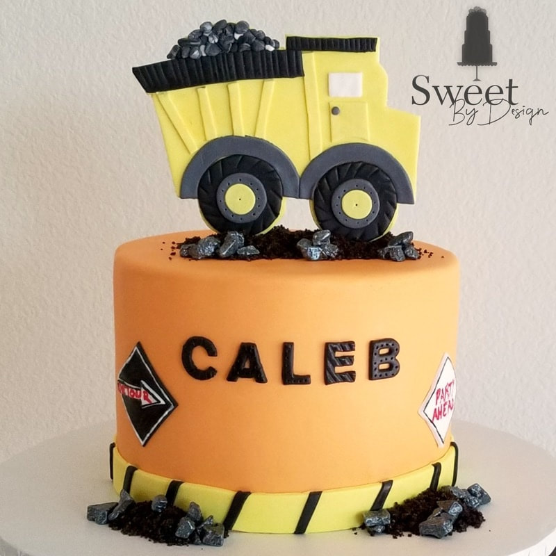 Construction dump truck birthday cake by Sweet By Design