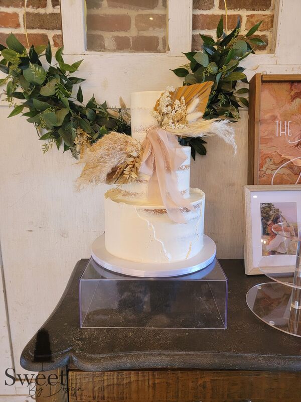 Semi naked wedding cake Sweet By Design Cakes