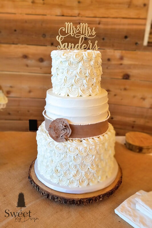 Rosette and texture buttercream wedding cake with fondant burlap by Sweet By Design