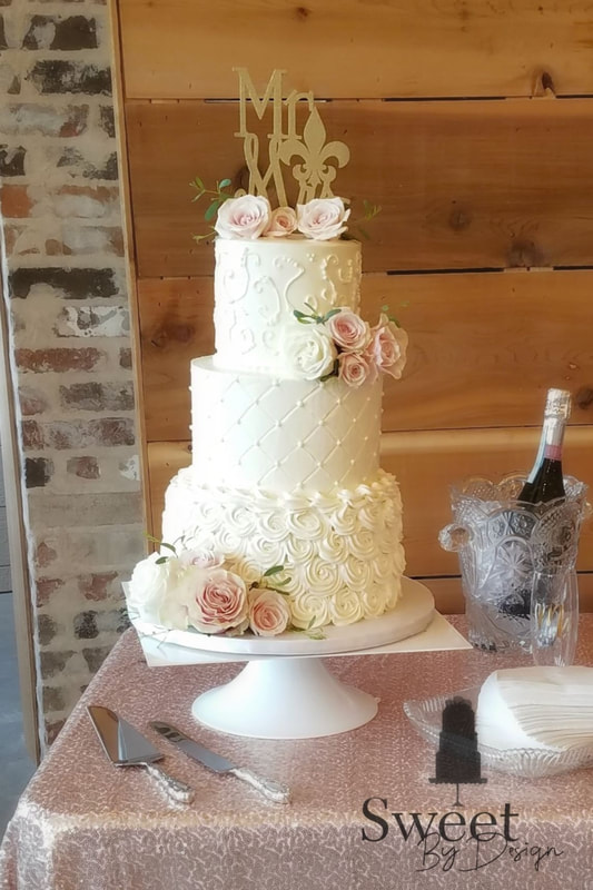 Buttercream wedding cake by Sweet By Design 