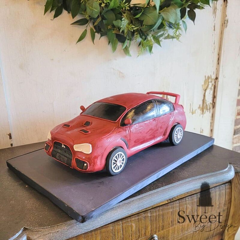 3D carved car groom's cake Sweet By Design