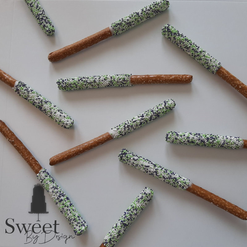 Chocolate dipped pretzel rods by Sweet By Design