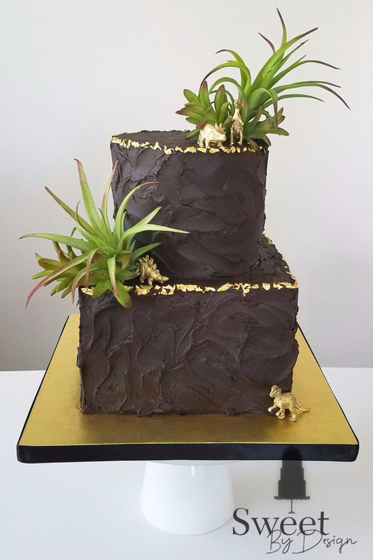 Chocolate textured buttercream dinosaur groom's cake by Sweet By Design