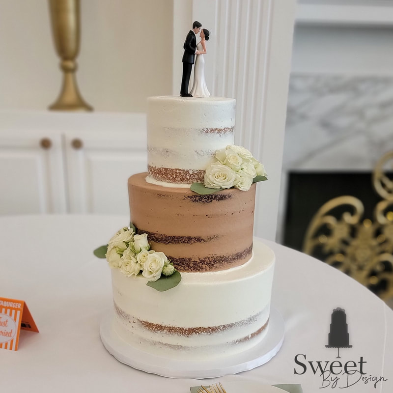 White and chocolate semi iced naked wedding cake