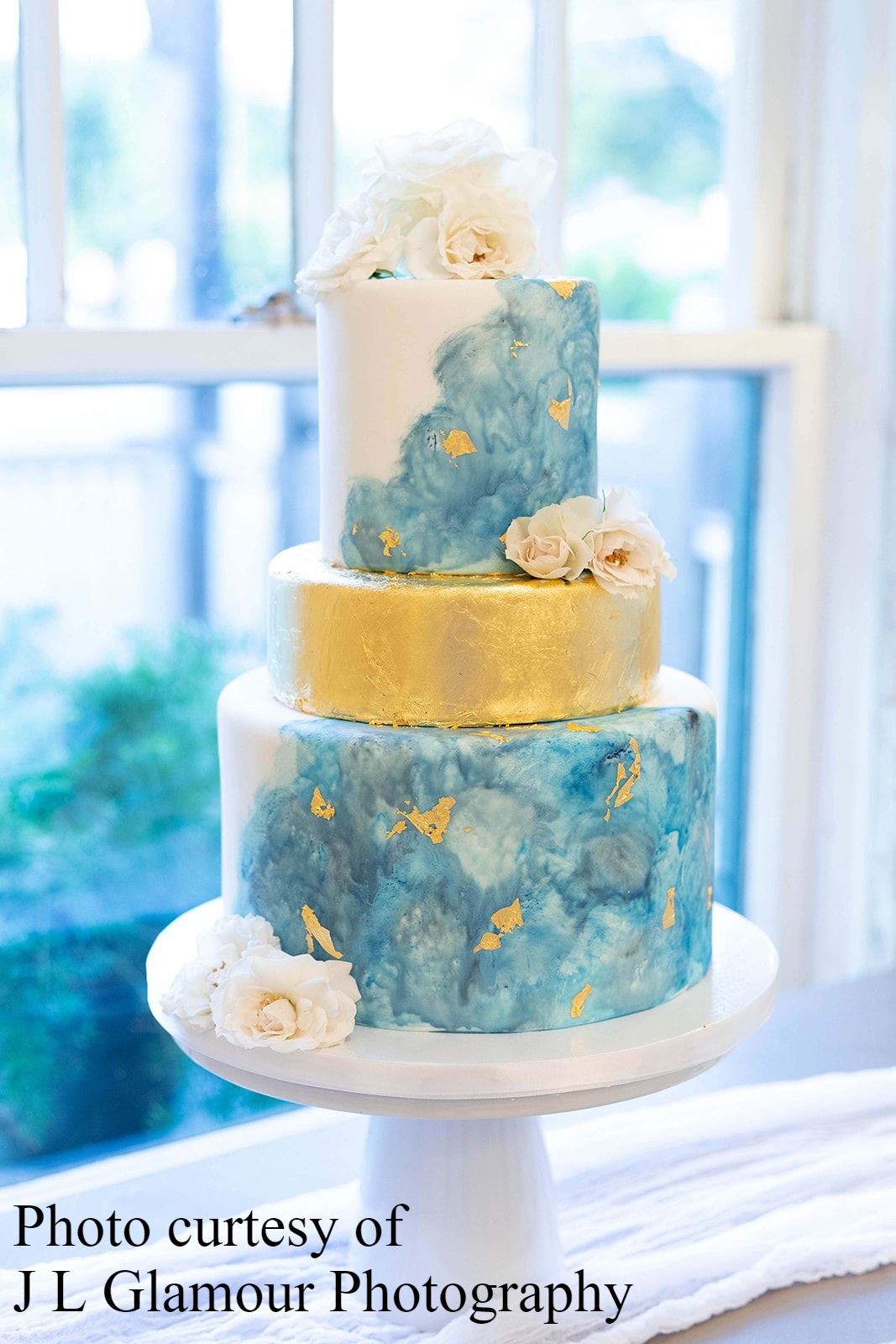 Blue watercolor and gold leaf wedding cake by Sweet By Design