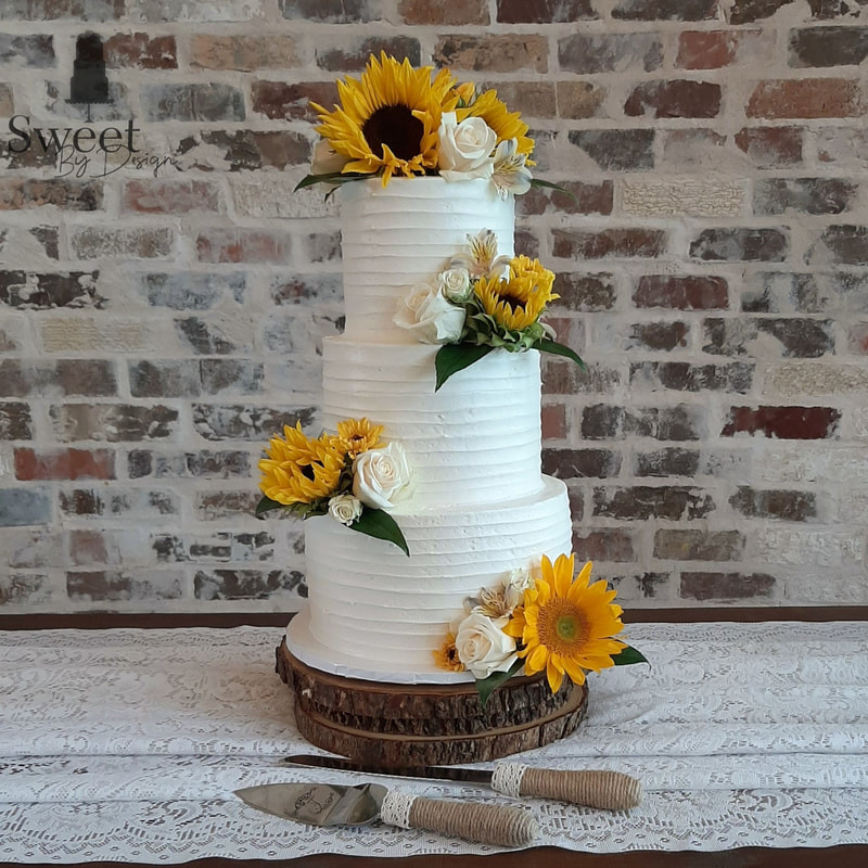 Horizontal line and sunflower wedding cake
