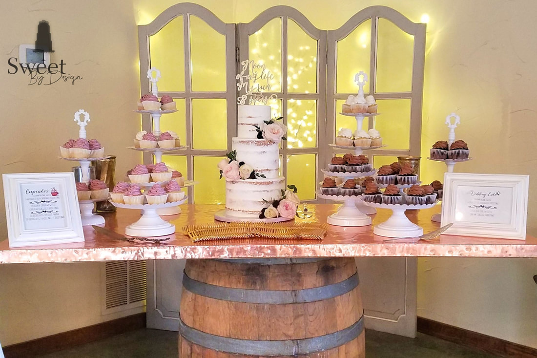 Semi iced wedding cake and cupcakes by Sweet By Design