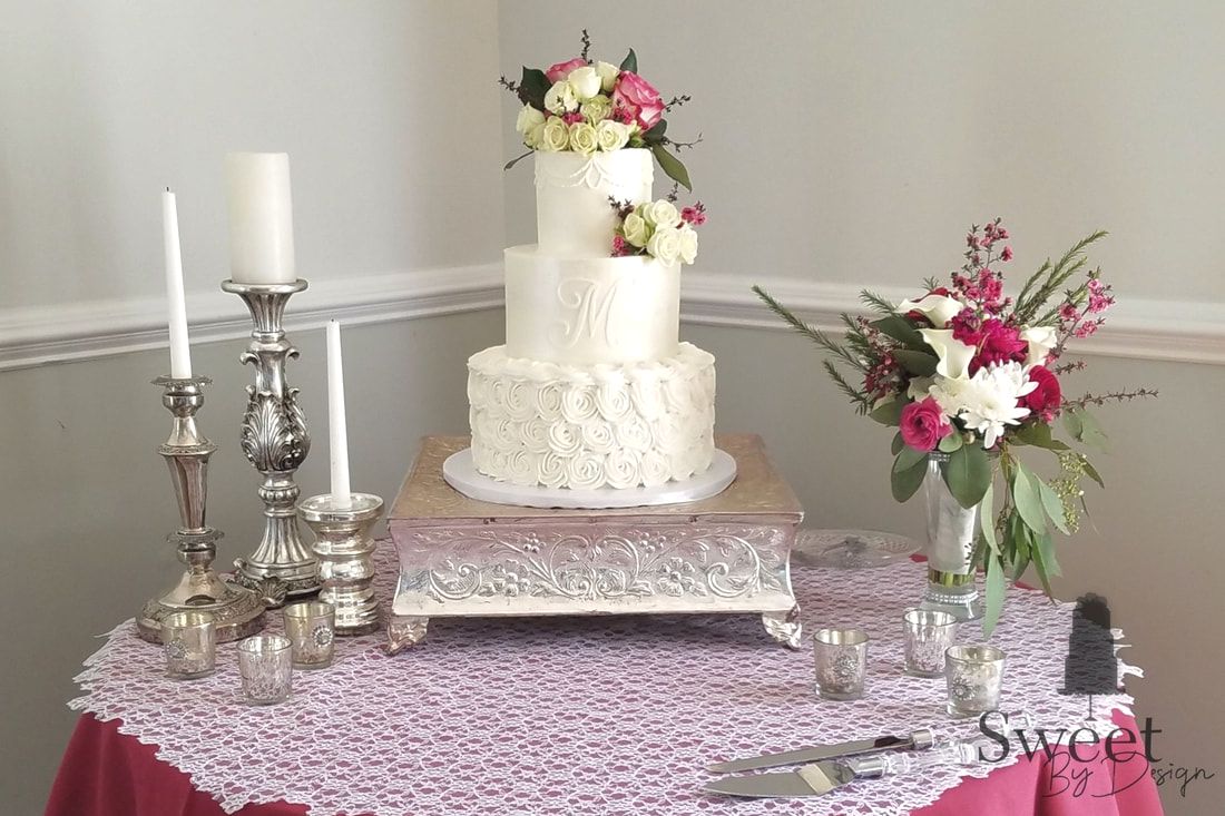 Buttercream wedding cake with monogram by Sweet By Design