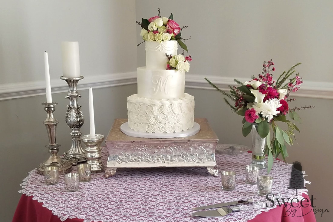 Buttercream wedding cake with monogram by Sweet By Design