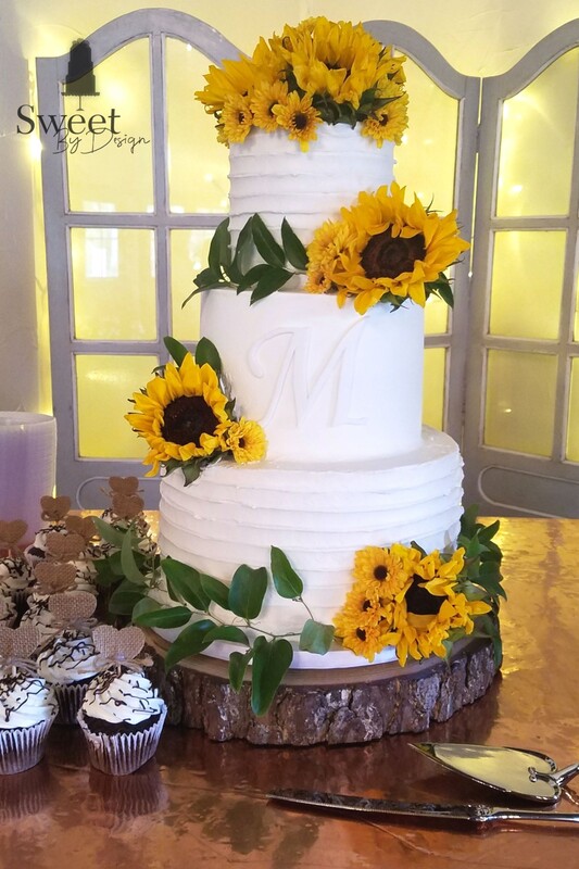 classic wedding cake with sunflowers