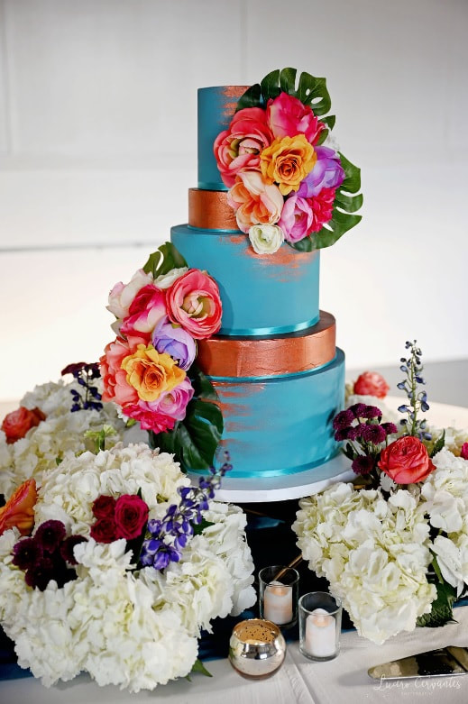 Blue and copper tropical wedding cake