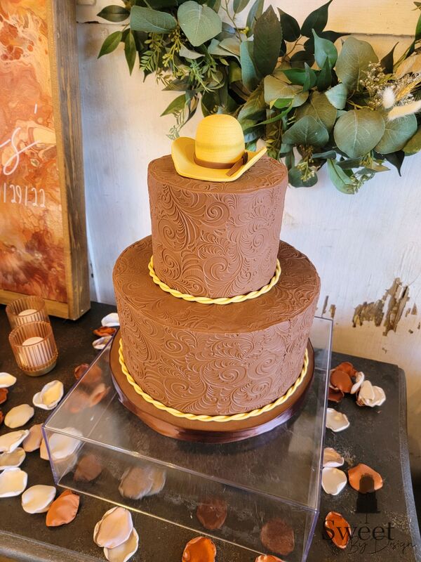 Tooled leather groom's cake by Sweet By Design