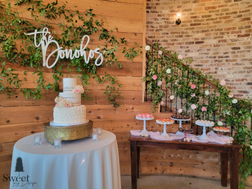 Wedding cake and dessert table by Sweet By Design